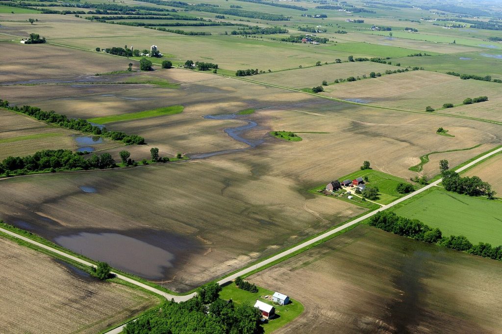Farmland divided into fields, seen from the air